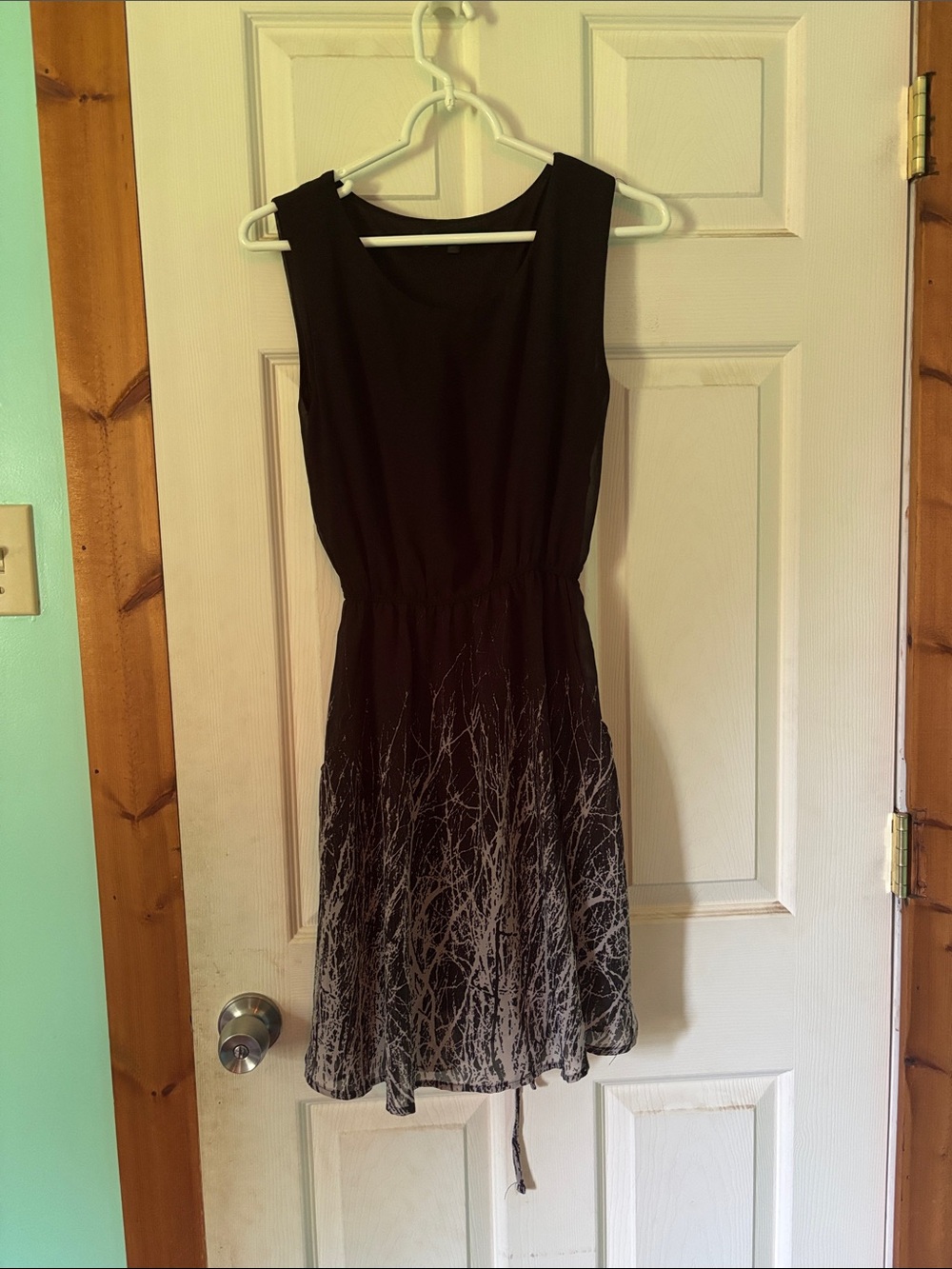 Black Sleeveless Mini Dress with White Branch Print Hem
